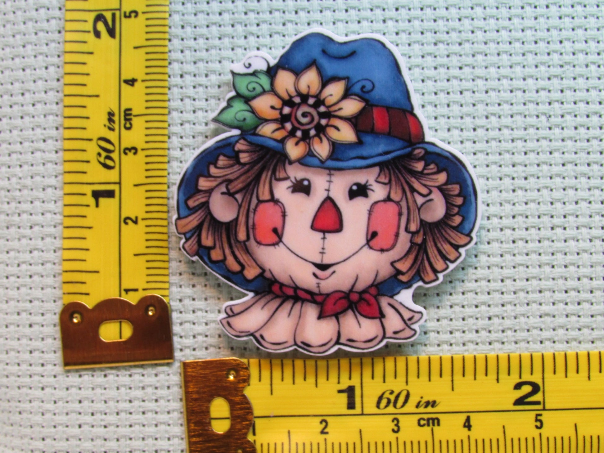 Third view of the Scarecrow Needle Minder